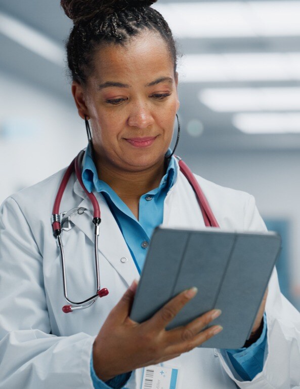 doctor-on-tablet-vertical