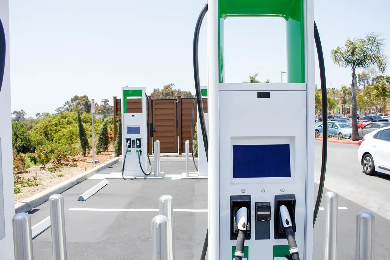 EV chargers connected via cellular in retail parking lot - photo