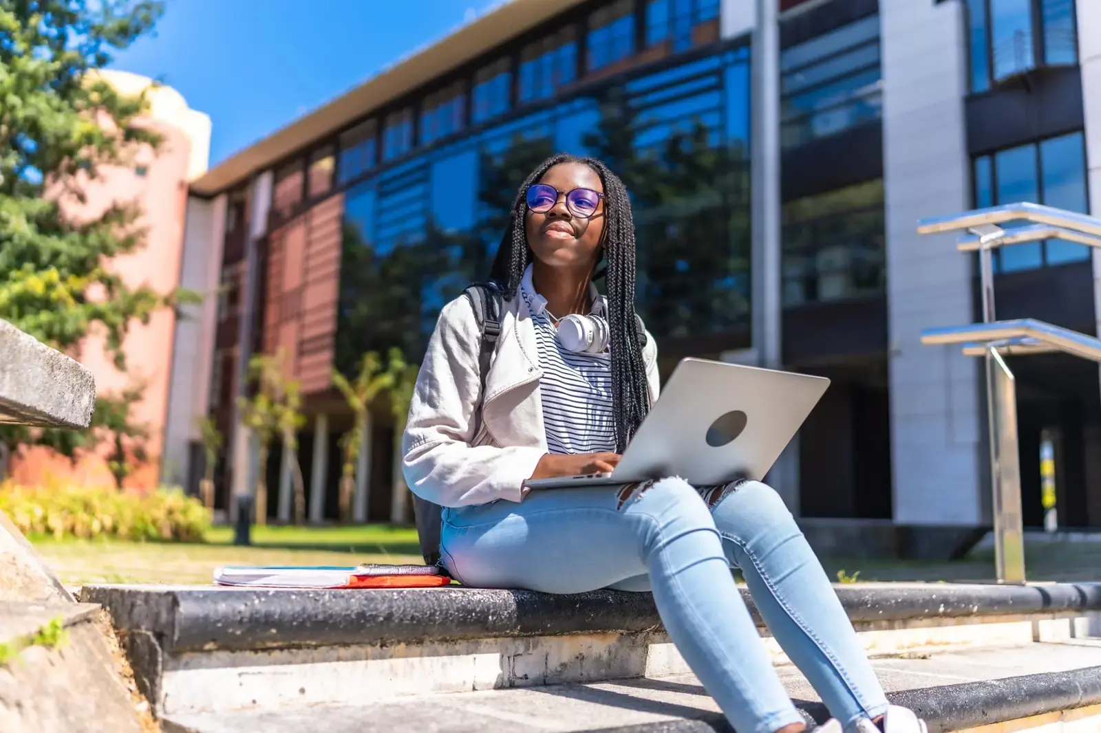 student-using-5g-wireless-laptop-for-homework-outside_min