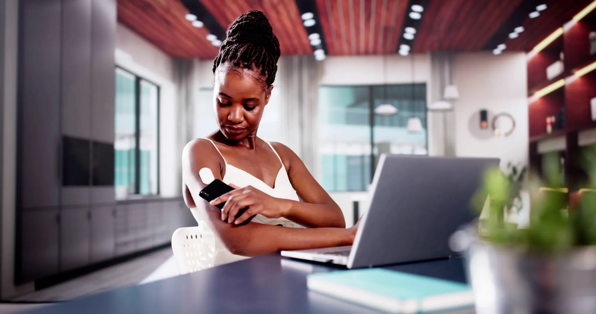 Woman using cellular-connected telehealth device - photo